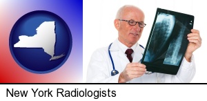 a radiologist looking at an x-ray image in New York, NY