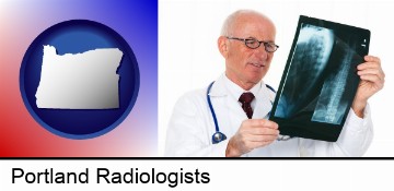 a radiologist looking at an x-ray image in Portland, OR
