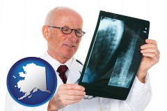 ak map icon and a radiologist looking at an x-ray image