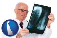 de map icon and a radiologist looking at an x-ray image
