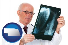 ne map icon and a radiologist looking at an x-ray image