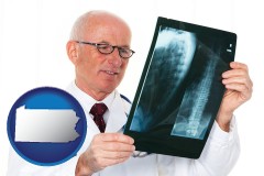 pa map icon and a radiologist looking at an x-ray image