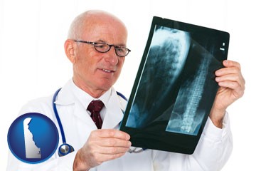 a radiologist looking at an x-ray image - with Delaware icon