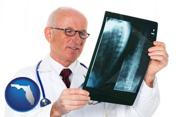 a radiologist looking at an x-ray image - with Florida icon