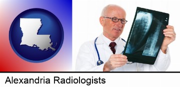 a radiologist looking at an x-ray image in Alexandria, LA